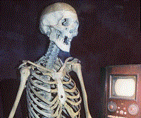 Skeleton watching TV